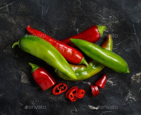 Red and green sweet peppers by katrinshine on PhotoDune. Red and green sweet peppers on dark background Rye Grain, Green Split Peas, Sweet Peppers, Black Rice, Split Pea, Stuffed Sweet Peppers, Hemp Seeds, Dark Background, Stuffed Hot Peppers