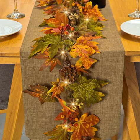 PRICES MAY VARY. Festive Fall Décor: Enhance your home with the 6 ft fall maple garland. This beautifully crafted garland features realistic maple leaves, berries, and pine cones, capturing the ambiance of the season Warm Lighting: Add a cozy and inviting atmosphere to your space with the fall garland warm lights. The 30 warm-colored lights are equipped with a timer function (6 hours on, 18 hours off) and powered by 3 AA batteries (not included) Versatile Display: With a length of 6 ft, the fall Fall Decor Garland, Thanksgiving Fireplace, Fireplace Table, Harvest Decor, Fall Garland, Fall Table Decor, Harvest Decorations, Christmas Fireplace, Leaf Garland