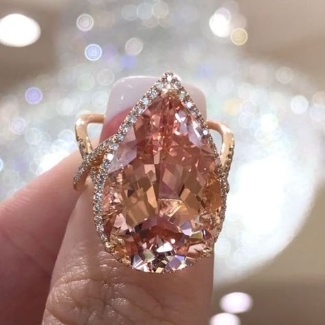 The most spectacular pear morganite engagement ring ✨ shop link in the bio http://bit.ly/PearMorganiteRing Pink Engagement Rings, Morganite Engagement Ring Halo, Pear Engagement Ring Halo, Hand Jewelry Rings, Pink Engagement Ring, Opal Engagement Ring, Morganite Diamond, Opal Engagement, Morganite Engagement