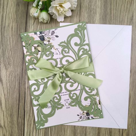 PRICES MAY VARY. Package including: 25 * Invitations Pockets + 25 * Cream Envelopes+25 * Blank Inner Sheets +25 * Ribbons Invitation Pocket:250g Quality Cardboard,4.9 *7.2.Its a whole blank set. The Inner Sheet is BLANK, no flower no text, it is shimmery ivory cardstock. You need laser printer to print. The Ribbons are flat sending, you need to tie bow by yourself. The Invitations are perfect for wedding, bridal shower, engagement, anniversary, festival, birthday, graduation, sweet 16 ect. 25PCS Princess And The Frog Invitations Quince, Xv Invitations Green, Light Green 15 Decorations, Sage Party Theme, Sage Green 15 Invitations, Pastel Green Quinceanera Theme, Quinceanera Themes Sage Green, Sage Green Invitations Quince, Sage Green Quince Decorations