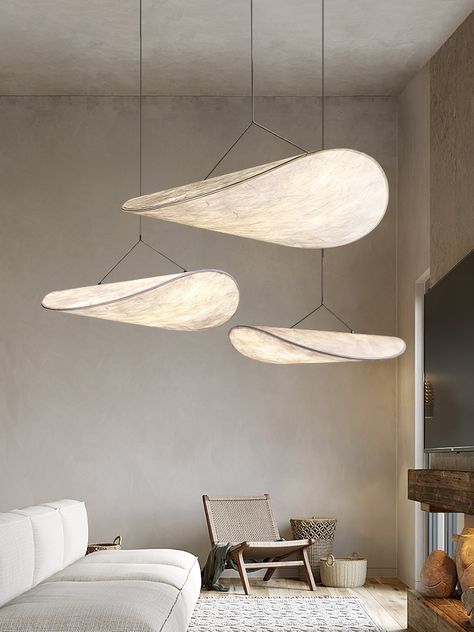 With a length of 80cm, the TENSE pendant light looks like a gentle cloud floating in. The soft Tyvek diffuser, a truly modern construction, is a durable yet soft material that is 100% recyclable. The flexibility of this paper-like shade allows the slender frame to accentuate the cloud-like qualities of the TENSE pendant light. The luminaire is fitted with a slim LED Light source and all components fit into a slim box for easy transportation. A truly modern approach to lighting. 
 Hook style picture display: 
 
 The difference between white light and warm light 
 
 If you have any questions about our products, please contact us and we will get back to you within 24 hours. 
 Product Size 
 Size: Dia 40cm x W 37cm x H 15cm / ∅ 15.7″ x W 14.6″ x H 5.9″ (Power: 20W) 
 Size: Dia 50cm x W 47cm x Modern Wabi Sabi, Traditional Ceiling Lights, Island Pendant Lights, Kitchen Island Lighting Pendant, Bedroom Bar, Kitchen Island Pendants, Led Pendant Lights, Modern Pendant Light, Modern Pendant