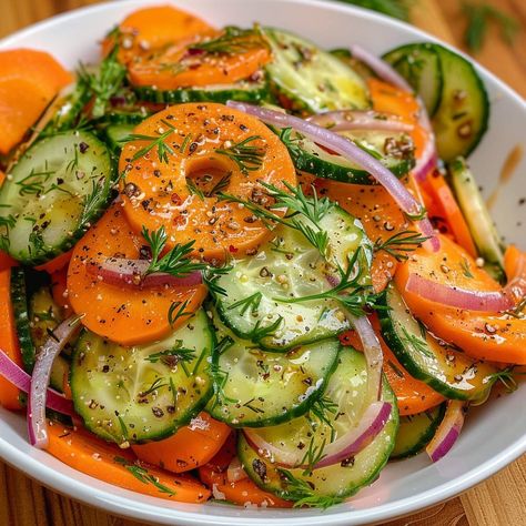 🥒🥕 Refresh your palate with this light, crunchy cucumber and carrot salad! #CucumberCarrotSalad #HealthyEats 🍽️ Cucumber and Carrot Salad 🛒 Ingredients: 200 grams cucumbers, thinly sliced 200 grams carrots, julienned 50 grams red onions, thinly sliced 15 grams fresh dill, chopped Dressing: 30 ml olive oil 15 ml white vinegar 10 ml honey Salt and pepper to taste 👩‍🍳 Instructions: Prepare Dressing: Whisk together olive oil, vinegar, honey, salt, and pepper. Combine Salad: In a large bowl, m... Recipes Cucumber, Benefits Of Cucumber, Salad With Dill, Fresh Vegetable Recipes, Instagram Recipes, Fresh Salad Recipes, Meat Free Recipes, Cucumber Recipes Salad, Cucumber Recipes