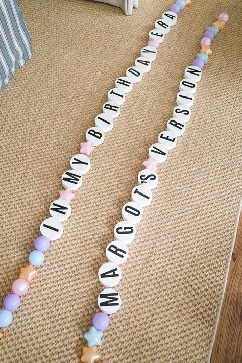 DIY Friendship Bracelet Banner for a Taylor Swift Party Diy Giant Friendship Bracelet Garland, Friendship Bracelet Banner Diy, Friendship Bracelet Garland Diy, K Pop Party Ideas, Friendship Bracelet Banner, Taylor Swift 4th Birthday, Friendship Bracelet Station, Friendship Bracelet Birthday Party, Taylor Swift Birthday Banner