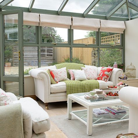 Green conservatory with cream sofas | Conservatory decorating | Style at Home | Housetohome.co.uk Conservatory Lighting Ideas, Conservatory Dining Room Ideas, Conservatory Interiors Ideas, Conservatory Ideas Interior Decor, Conservatory Ideas Interior, Small Conservatory Ideas, Green Conservatory, Orangery Interior, Cream Sofas