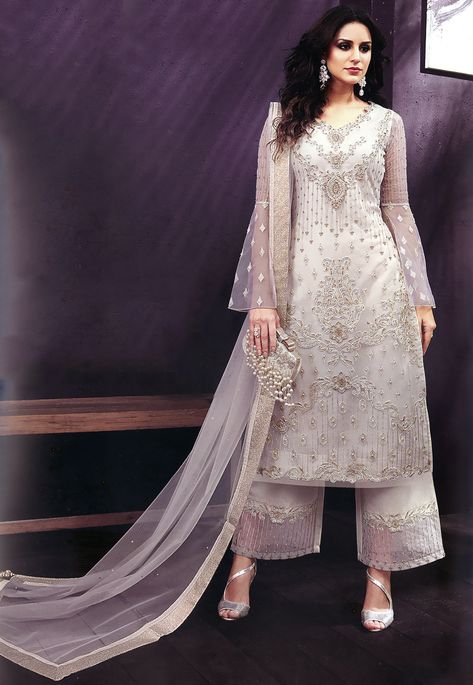 Semi-stitched Net Pakistani Suit in Off White This V Neck and Bell Sleeve attire with Poly Shantoon Lining is Prettified with Resham, Zari, Stone, Dori and Patch Border Work Available with a Off White Poly Shantoon Palazzo and a Off White Net Dupatta The Kameez and Bottom Lengths are 44 and 38 inches respectively Do note: The Length may vary upto 2 inches. Accessories shown in the image are for presentation purposes only.(Slight variation in actual color vs. image is possible). Plazoo Suite Design, White Net Dupatta, Pakistan Clothes, Velvet Dress Designs, Pakistani Suit, Desi Wear, Suit White, Pakistani Designer Suits, Salwar Kamiz