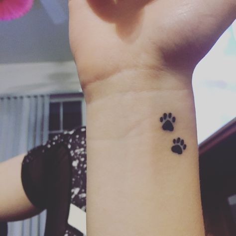 Paw print tattoo Hand Print Tattoos, Cat Paw Print Tattoo, Cat Paw Tattoos, Animal Tattoos For Women, Pawprint Tattoo, Dog Paw Tattoo, Cool Wrist Tattoos, Paw Tattoo, Tiny Tattoo