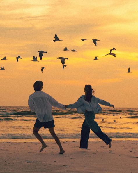 You are alive!! Feel the warm air fill your lungs and the sun kiss your cheek. Chase the birds and splash in the waves. That’s the stuff memories are made of. Part 2 of this dreamy night with @nataliezacek & Josh 🤎🎥🎞️ . . keywords - sunset, florida, beach aesthetic, blue hour, golden hour, couples photos, Pinterest, art, visual poetry, feeling alive, life is a movie, free, young love, nostalgia, joy, colorful photography, cinematic photography, authenticity, candid photography, cinema, film Young And Free Aesthetic, Beach Film Aesthetic, Cinematic Photography Couple, Couple In Sunset, Summer Love Aesthetic, Couple Golden Hour, Florida Beach Aesthetic, Beach Couple Photography, Billboard Ideas