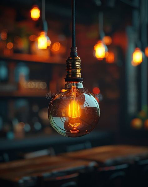 Edison light bulb in the restaurant. An incandescent light bulb hanging from the ceiling stock photography Edison Light, Incandescent Light Bulb, Incandescent Light, Edison Lighting, Incandescent Lighting, The Ceiling, The Restaurant, Edison Light Bulbs, Stock Photography