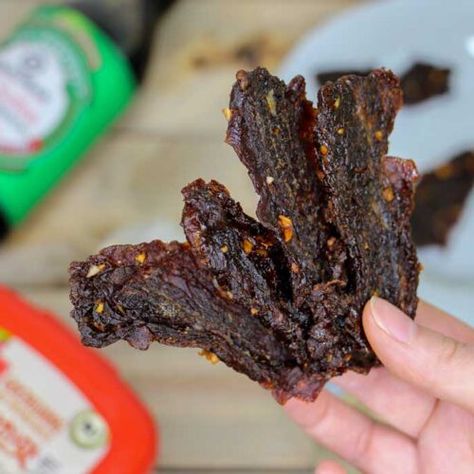 Spicy Beef Jerky Recipe - Pepper Geek Deer Jerky Marinade, Sweet And Spicy Beef Jerky Recipe, Spicy Beef Jerky Recipe, Sweet And Spicy Beef, Jerky Marinade Recipes, Beef Jerky Recipe Dehydrator, Beef Jerky Marinade, Spicy Beef Jerky, Deer Jerky Recipe