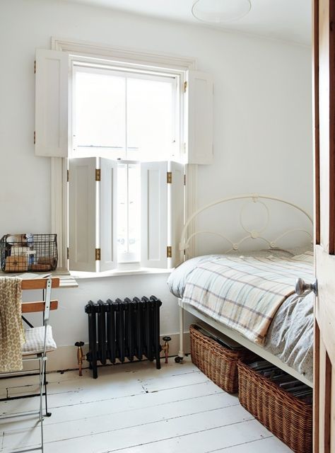 Sara Emslie London bedroom with Shutters / Remodelista Shutters Interior, Indoor Shutters, London Bedroom, Interior Window Shutters, Interior Shutters, Country Cottage Decor, Deco Retro, Window Shutters, Under Bed