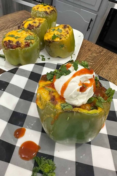 Cheesy taco stuffed peppers are delicious and easy to make in an air fryer! Taco Stuffed Bell Peppers, Cooking In The Midwest, Taco Stuffed Peppers, Cheesy Rice, Drying Cilantro, Garlic Butter Steak, Steak Butter, Steak Bites, Beef And Rice