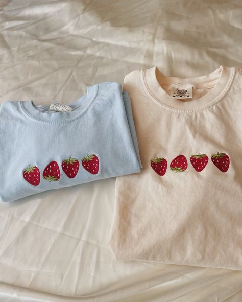 "Embroidered Strawberry T-Shirt -Embroidered on 100% Cotton, Comfort Colors Brand T-shirts. This design is simple and minimalistic, perfect for every outfit!  -Embroidery design measures 5\"x 1.5\" -See product pictures for shirt sizing chart. These t-shirts run true to size, so if you like an oversized look, we recommend sizing up 1 size!  -All t-shirt designs are handmade on an embroidery machine so there may be slight differences, but we only sell the shirts that meet our high-quality standar Simple Embroidery Machine Designs, Handmade T Shirt Design, Embroidery With Machine, Machine Embroidery Shirt Designs, Simple Clothing Design, Cute Embroidery Designs Sweatshirts, Cute Embroidery On Tshirts, Summer Embroidery Designs Shirts, Embroidery Designs For T Shirts