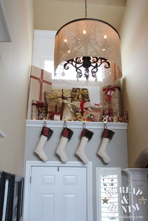 Christmas Presents Tucked Above the Front Door Above Front Door Decor, Above Door Decor, Plant Ledge, Door Lighting, Ledge Decor, Christmas Foyer, Lighting House, Front Door Lighting, Christmas House Tour