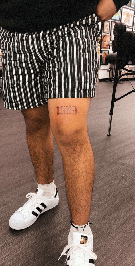 Flower Tattoo Men Leg, Thigh Year Tattoo, Mens Above Knee Tattoo Ideas, Mens Tattoos Ideas Thigh, 1969 Tattoo Ideas, Mens Legs Tattoo, Leg Tattoo Men Patch Work, Small Quad Tattoos For Men, Men’s Knee Tats