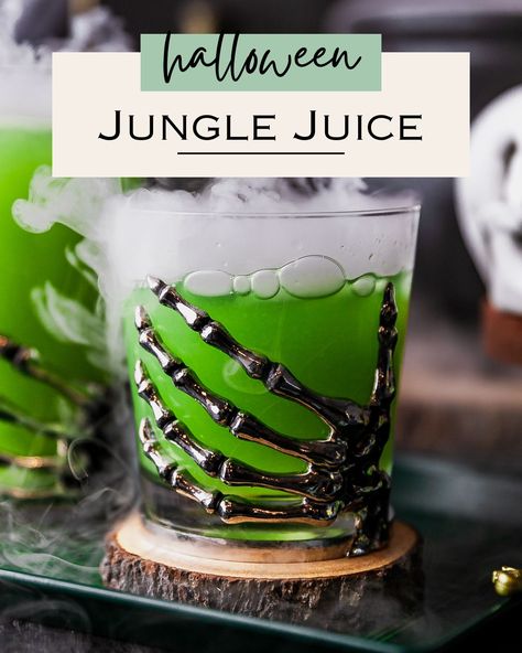 Prepare to be enchanted by our Halloween Jungle Juice! With a bewitching blend of tropical flavors and a dash of spookiness, this eerie elixir will haunt your senses in the best way possible. Dive into the unknown and let the Halloween adventure begin! 🦇🥂 #HalloweenMagic #EnchantedElixirs #SipAndScream Jungle Juice Halloween, Green Jungle Juice Recipe, Halloween Jungle Juice, Alcoholic Jungle Juice, Easy Jungle Juice, Dry Ice Halloween, Spooky Island, Halloween Party Punch, Jungle Juice Recipe