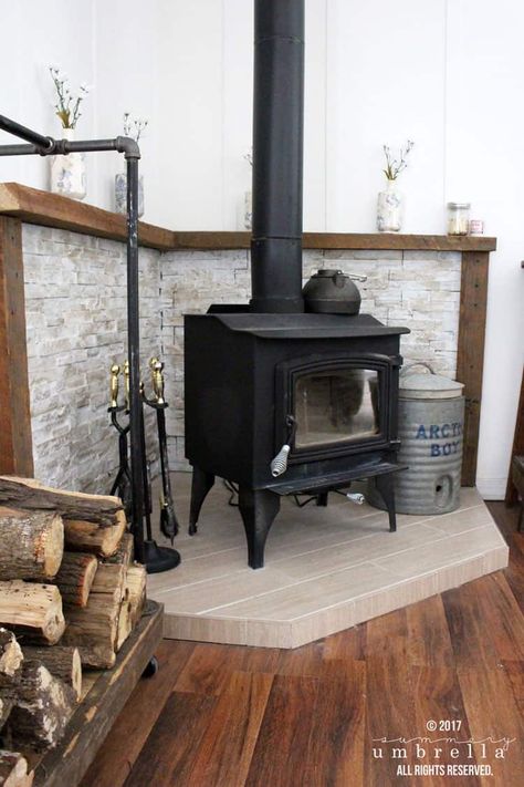 Do you desperately need a mantle update? I feel your pain! I was going through the same dilemma until I figured out how to do this easy DIY. Wood Stove Decor, Wood Burning Stove Corner, Corner Wood Stove, Wood Stove Surround, Corner Stove, Wood Stove Wall, Stove Decor, Wood Stove Hearth, Wood Burning Stoves Living Room