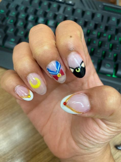 Nail art idea. Sailor moon inspired with four different designs on the nails Sailor Moon Nail Art Design, Anime Nails Sailor Moon, Short Sailor Moon Nails, Sailormoon Nail Design, Sailor Moon Nails Simple, Sailor Moon Nails Acrylic, Moon Nails Acrylic, Sailor Moon Nails Design, Sailor Moon Inspired Nails