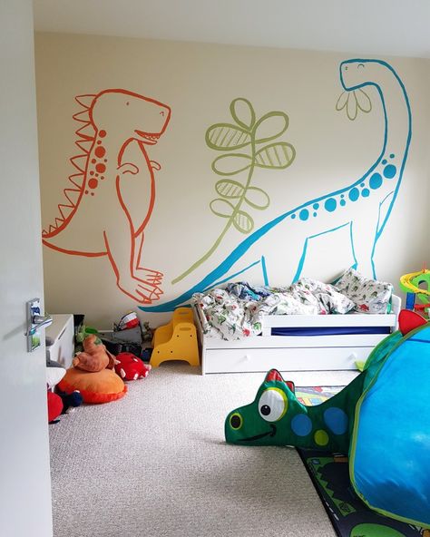 Dinosaurs painted on toddler bedroom wall Dino Wall Painting, Dinosaur Bedroom Mural, Dinosaur Wall Painting, Dinosaur Wall Mural, Dinosaur Bedroom Wall, Toddler Bedroom Wall, Animal Wall Mural, Dinosaur Mural, Kids Bedroom Paint