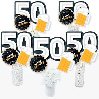 Cheers and Beers to 50 Years Centerpiece Sticks INCLUDES 15 fiftieth party table toppers in three different shapes, 15 wooden dowel sticks and stickers for easy assembly. Beer 50th party table decorations are perfect for a birthday party. Cheers and Beers to 50 Years Centerpiece Sticks SIZE five 50 table toppers, 10.75" wide x 7.75" tall; five beer mug table toppers, 5.25" wide x 6.75" tall; and five circle table toppers, 6" wide x 6" tall. The unique design and variety of pieces makes this tabl Beer Themed Birthday Party Decorations, Cheers And Beers Party Decorations, 40th Birthday Centerpieces For Men, 21st Birthday Party Centerpieces, Beer Mug Centerpiece, 30th Birthday Party Centerpieces, 40th Birthday Party Centerpieces, 50th Birthday Party Centerpieces, Happy Birthday 40