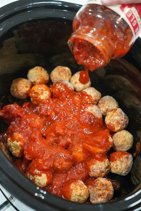 Frozen meatballs in Crockpot come out tender and delicious with your choice of sauce on top. Use as an appetizer or dinner idea with pasta. Sausage And Meatballs Crockpot, Meatballs And Sauce In Crockpot, Frozen Italian Meatballs Crockpot Appetizers, Crockpot Spaghetti And Meatballs Frozen, Frozen Meatball Dinner Ideas Crock Pot, Frozen Italian Meatball Recipes Crockpot, Frozen Meatballs Crockpot Marinara, Meatballs In Crockpot Frozen, Meatball In Crockpot