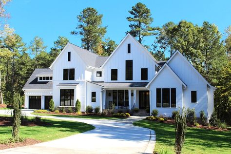 This beautiful farmhouse features board and batten with black exterior windows that pop against the white exterior creating a very crisp and clean look. #modernfarmhouse #dreamhouse #boardandbatten #farmhousestyle #modernfarmhousestyle Sims Farm, Exterior Facelift, Luxury Modern Farmhouse, Sophisticated Farmhouse, White Farmhouse Exterior, Texas Farmhouse, Exterior Windows, White Modern Farmhouse, Archie Bunker