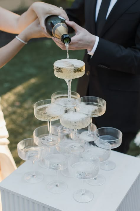 Wedding champagne tower Champagne Tour Wedding, Champagne Tower How To, Champagne Wedding Tower, Prosecco Tower Wedding, Outdoor Champagne Tower, Small Champagne Tower Wedding, Champagne Pour Wedding, Diy Champagne Tower, Champagne Tower Diy