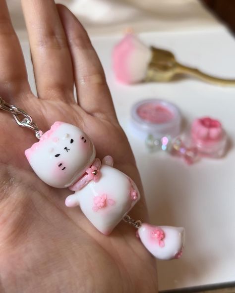 I got Mr. Lucky a companion ✨🎀 this is Princess Blossom. She is from my new Sakura collection which I’ll be revealing soon. Aaaand, I might giveaway a few items from this Sakura collection 👀 🌸 stay tuned. #sakuracat #luckycatcharm #handmade #polymerclay #coldporcelain #catcharm #catkeychain #handmadekeychain #cute #clayart #claycat #kawaii #clayartist #miniature Hello Kitty Polymer Clay, Cute Clay Charms, 3d Wall Painting, Diy Miniatures, Clay Keychain, Cute Miniature, Clay Crafts Air Dry, Sakura Flower, Cat Keychain