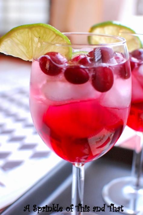 Sparkling Cranberry Spritzer for your next gathering. A fun, non-alcoholic drink to put some fizz in your holidays! Raspberry Punch Recipes Non Alcoholic, New Years Punch, Cranberry Spritzer Non Alcoholic, Cranberry Limoncello Spritzer, Sprite Cranberry Cocktails, Punch Non Alcoholic, Sparkling Cranberries, Punch Recipes Non Alcoholic, Sprite Cranberry