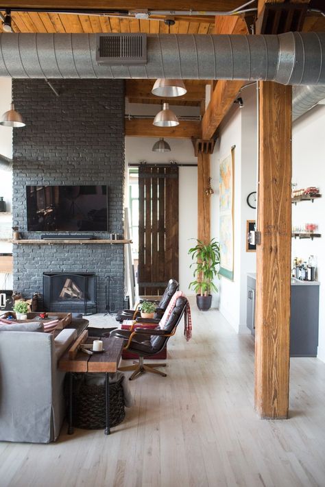 An industrial Chicago loft living room with exposed beams & ducts, and a gray painted fireplace wall. Grey Painted Fireplace, Living Room Zones, Fireplace Beam, Living Room Loft, Loft Living, Loft House, Industrial Loft, Bedroom Loft, Living Room With Fireplace