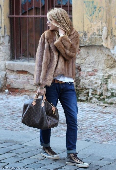 Shop this look on Lookastic:  http://lookastic.com/women/looks/sunglasses-watch-jacket-crew-neck-t-shirt-belt-bracelet-tote-bag-boyfriend-jeans-high-top-sneakers/5427  — Grey Sunglasses  — Gold Watch  — Brown Fur Jacket  — White Crew-neck T-shirt  — Brown Suede Belt  — Gold Bracelet  — Dark Brown Print Leather Tote Bag  — Navy Boyfriend Jeans  — Charcoal Leather High Top Sneakers Converse Street Style, Short Faux Fur Coat, Fur Coat Outfit, Stylish Winter Coats, High Wasted Jeans, Chique Outfit, Mode Hippie, Winter Fur Coats, Jean Trends