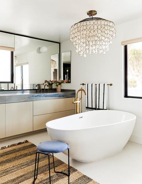 Marble Herringbone Floor, Celebrity Bathrooms, Oval Bathtub, Capiz Chandelier, Bathroom Remodel Inspiration, Los Angeles Interior Design, Modern Bathtub, White Tub, White Shiplap Wall