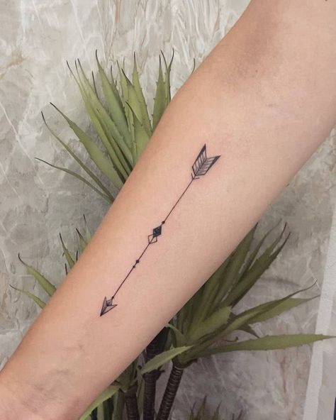 Fine line arrow tattoo on the inner forearm. Fine Line Inner Forearm Tattoo, Dog Arrow Tattoo, Arrow On Finger Tattoo, Fine Line Arrow Tattoos For Women, Arrow Tattoo Arm Women, Strength Arrow Tattoo For Women, Arm Arrow Tattoos For Women Forearm, Sun Arrow Tattoo, Arrow Fine Line Tattoo