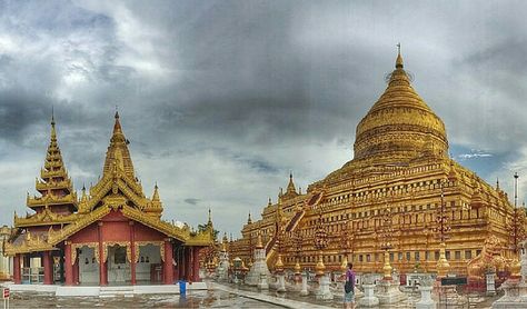 Yes, it’s true the Shwezigon Pagoda stands with all its might and has suffered many weathers ever since it was built. When it rains, one can easily expect its compound to fill up with water but it doesn’t. Devotees love their deity and here the deity seems to love the devotees back. Shwezigon Pagoda, When It Rains, Barcelona Cathedral, Building, Water, Travel, Quick Saves