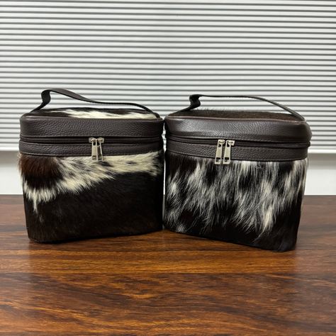 Spark your beauty routine with our luxurious Cowhide Makeup Bag, handcrafted from premium cowhide leather for a touch of elegance and style. This chic and versatile makeup bag features a spacious interior to store all your beauty essentials, while the durable construction ensures long-lasting quality. The unique cowhide pattern adds a fashionable flair to this makeup bag, making it a statement accessory for your vanity box or on-the-go. The water-resistant and scratch-resistant properties of the Etsy Gifts For Women, Makeup Vanity Case, Cowhide Pattern, Handmade Makeup, Leather Waist Bag, Vanity Box, Real Leather Bags, Cowhide Bag, Vanity Bag