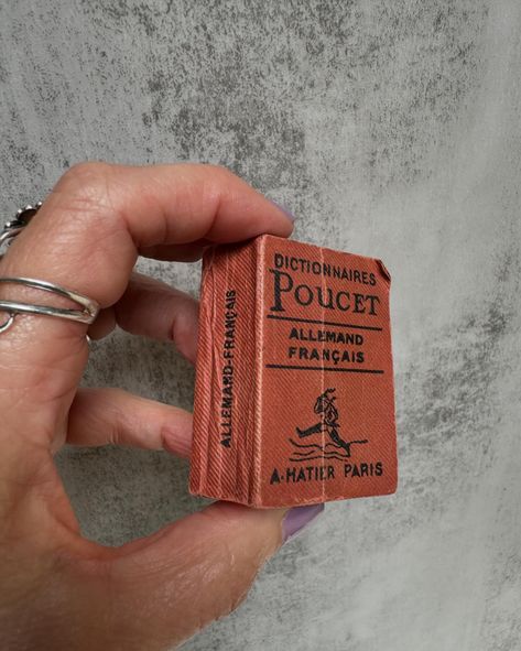 Miniature French dictionary. Get your reading glasses out! That’s some tiny print. #tinybooks #miniaturebook #frenchdictionary #miniatures French Dictionary, Dictionary Book, Tiny Prints, Miniature Books, Vintage Miniatures, Early 1900s, Reading Glasses, The Cutest, Music Book