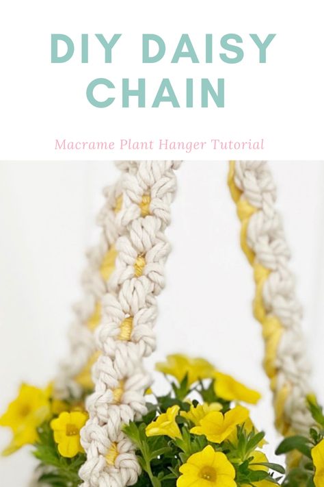 Daisy flower macrame plant hanger Flower Chain Macrame, Macrame Flower Plant Hanger, Macrame Daisy Chain Tutorial, Diy Macrame Plant Hanger Tutorials Easy, Macrame Daisy Chain, Macrame Wall Plant Hanger Diy, Free Macrame Patterns Plant Hangers, Daisy Chain Macrame, Beltane Ideas