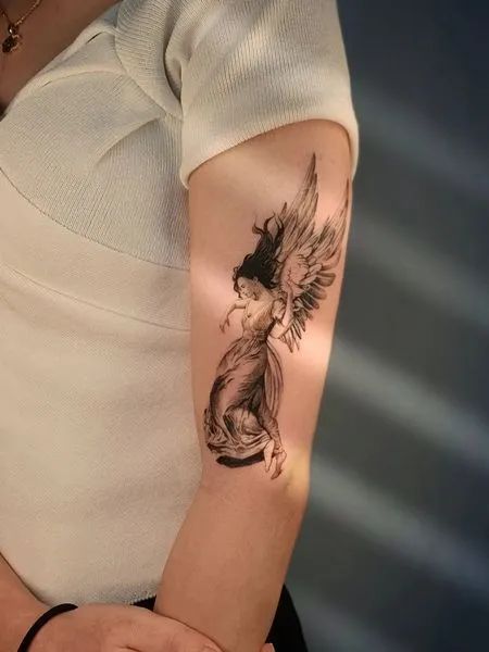 Rate This female sleeve tattoo black women ideas From ⭐1~10. SAVE & FOLLOW i will update everyweek. Angel Tattoo On Arm, Fallen Angel Tattoo For Women, Guardian Angel Tattoo For Women, Sleeve Tattoo Black Women, Female Angel Tattoo, Female Sleeve Tattoo Black Women, Small Tattoos Minimalist, Angel Tattoo Meaning, Angel Tattoo Arm