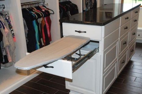 Custom-built white dressing room island in master bedroom closet with a pull-out ironing board that conveniently hides within the island when not in use. Ironing Board Storage, Master Closet Design, Closet Island, Walking Closet, Dream Closet Design, Closet Layout, Small Closets, Closet Remodel, Closet Organization Diy