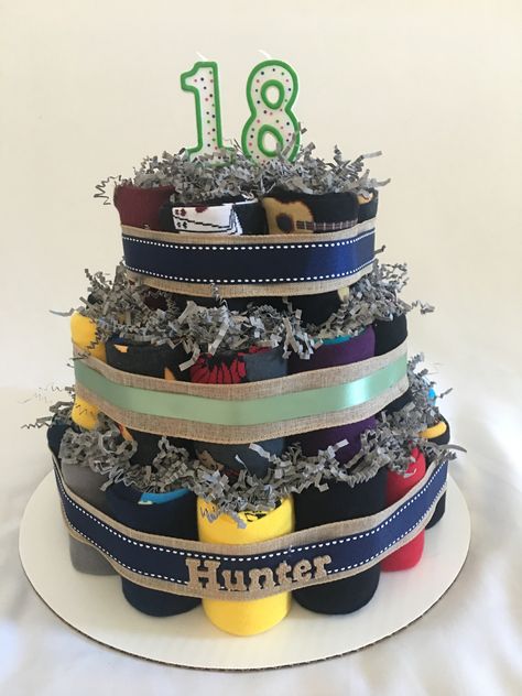 This cake is made up of 18 pairs of funny dress socks. It’s a custom cake for a young man turning 18 who loves socks! Sock Cake Ideas, Sock Cupcakes, Diy Socks, Custom Cake, Dress Socks, Custom Cakes, How To Make Cake, Graduation Gifts, Funny Gifts