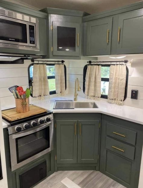 Green Cabinets In Camper, Coachmen Camper Remodel, Renovated Camper Kitchen, Sage Green Rv Interior, Sage Green Camper Interior, Trailer Life Aesthetic, Kitchen Trailer Ideas, Green Camper Cabinets, 5th Wheel Bathroom Remodel