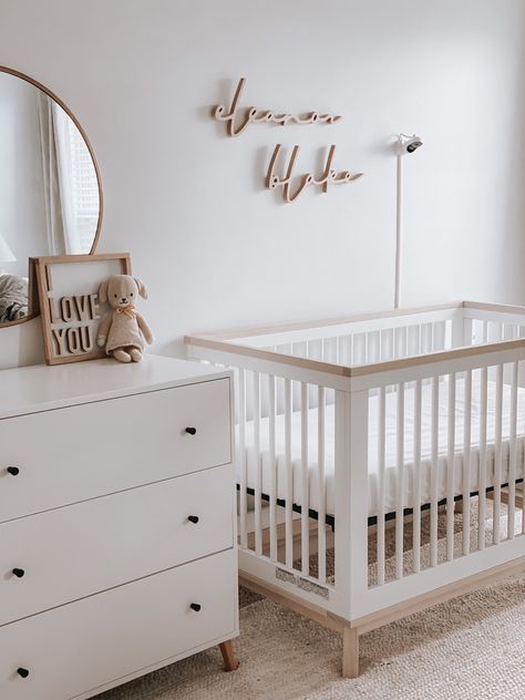 White And Wooden Nursery, Neutral Nursery Name Sign, Neutral Nursery Mirror, Grey White And Natural Wood Nursery, Baby Nursery White Furniture, White Crib And Dresser Nursery, Wooden Name Nursery, Oak And White Nursery, Minimalist Disney Nursery