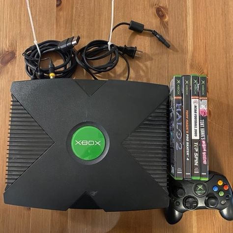 Original xbox console with controller and three games Three Games, Football Top, Original Xbox, Xbox Console, Tony Hawk, Fashion Closet, Ncaa Football, Xbox, Graphic Card