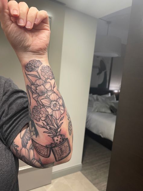 Zippo with daffodils and marigolds sleeve black and gray forearm Flowers Sleeve Tattoo, Daffodil Tattoo, Tattoo Forearm, Sleeve Tattoo, Forearm Tattoos, Forearm Tattoo, Black And Gray, Daffodils, Sleeve Tattoos