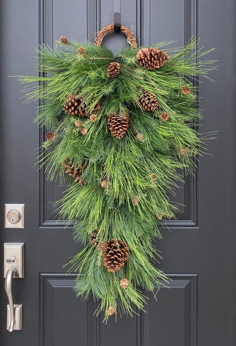 Christmas Teardrop Swag With Pine and Pinecones Holiday - Etsy Swag Front Door, Cedar Swag Diy, Christmas Teardrop Wreath, Teardrop Christmas Swag, Pine Boughs Decorations, Christmas Swag Ideas, Pine Swags Christmas, Diy Evergreen Swag, Christmas Swags For Front Door