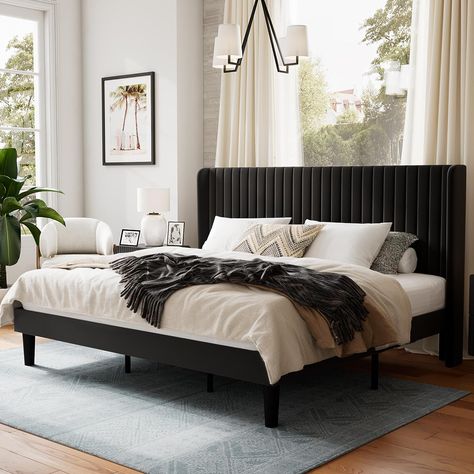 The bed frame is beautifully upholstered in soft velvet and features a wingback headboard design, adding a stylish touch of glamour to any home decor. Modern Style Bed, Velvet Bed Frame, Black Bed Frame, Lit King Size, Black Headboard, King Size Bed Frame, Wingback Headboard, Queen Size Bed Frames, Velvet Bed