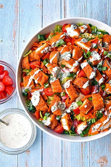 This Low FODMAP Air Fryer Buffalo Chicken Salad features crispy chicken tenders dipped in a homemade, buffalo-style hot sauce, placed on a crisp salad and topped with a cool and creamy low FODMAP homemade ranch dressing. Low FODMAP at 1 serving, Paleo, Whole30, lactose-free and grain-free. #goodnomshoney #lowfodmap #airfyer #airfryerrecipes #buffalochickensalad #buffalochicken #chickentenders #paleo #whole30 #salad #saladrecipes #lunch #dinner Low Fodmap Air Fryer, Chicken Tender Salad, Air Fryer Buffalo Chicken, Air Fried Chicken Tenders, Fodmap Chicken, Fodmap Recipes Dinner, Low Fodmap Chicken, Low Fodmap Recipes Dinner, Ranch Dressing Recipe Homemade