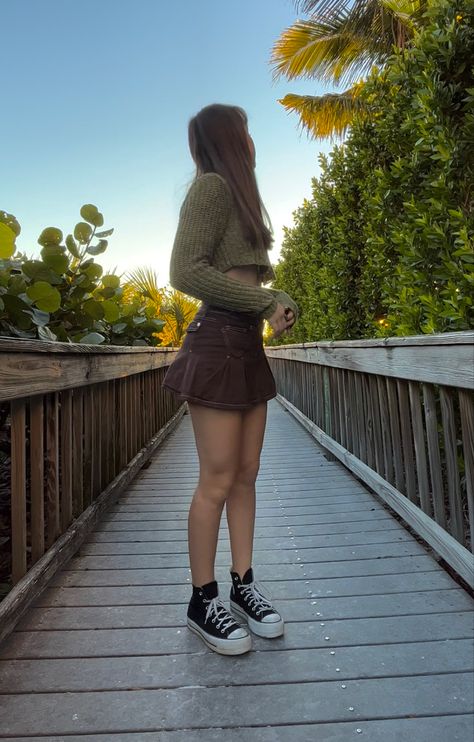 Skirt And Sweater Outfit Converse, Converse Outfit With Skirt, Mini Skirt And Converse Outfit, Brown Cargo Mini Skirt Outfit, Skirt And Converse Outfit Winter, Fall Skirt Outfits With Converse, Mini Skirt Converse Outfit, Skirts With Converse, Skirt With Converse