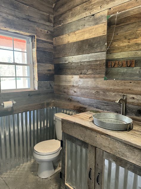 Galvanized Tin Walls Bathroom, Bathroom With Tin Walls, Rustic Industrial Bathroom Ideas, Rustic Half Bathroom, Rustic Tin Walls Ideas, Tin Wainscoting Bathroom, Corrugated Iron Bathroom, Tin And Wood Walls Bathroom, Galvanized Steel Bathroom