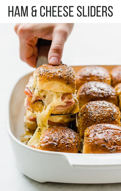 These easy Ham & Cheese Sliders are a family staple. They are super easy appetizer OR dinner to make, budget friendly, great recipe for a group of people, and even freezer friendly. I've been making these for YEARS and constantly have people ask for the recipe. #hamandcheesesliders #sliders #freezermeal #bakedsliders #hamandcheese #appetizer #kidfriendly Batch Meals, Super Easy Appetizers, Easy Kid Friendly Dinners, Ham Cheese Sliders, Ham And Cheese Sliders, Cheese Sliders, Easy Ham, Large Group Meals, Healthy Freezer Meals