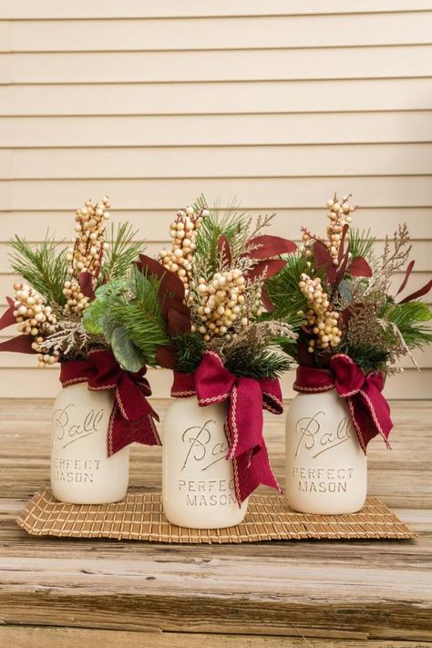 16 Best Winter Mason Jar Centerpieces for Weddings | Emmaline Bride Water Rangoli, Upcycle Jars, Winter Table Centerpieces, Mason Jar Christmas Decorations, Jars Decor, Mason Jar Christmas Crafts, Wedding Jars, Wedding Centerpieces Mason Jars, Mason Jar Centerpiece